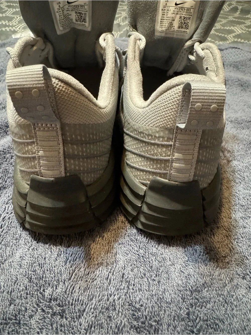 Nike Gray Shoe Size Label with Black Swoosh